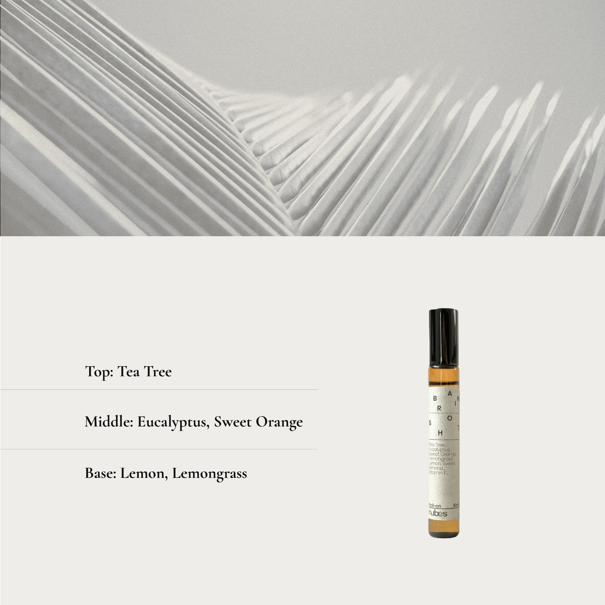 Roll on product with ingredient information on a gray background