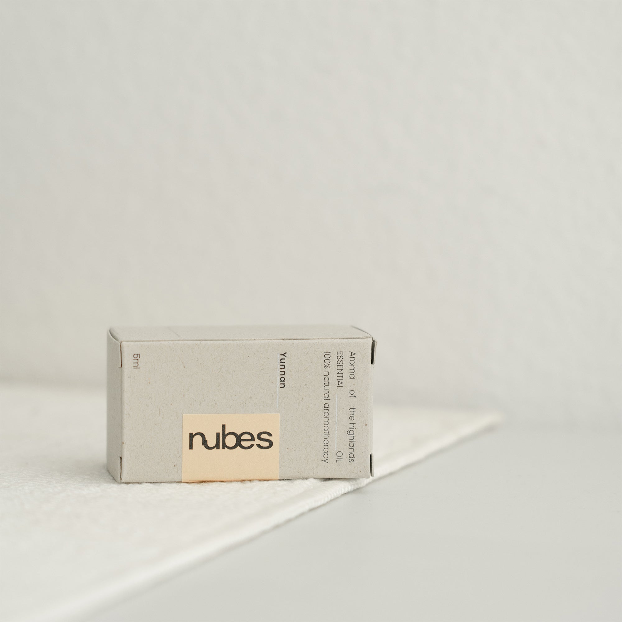 Box of nubes on a light gray background