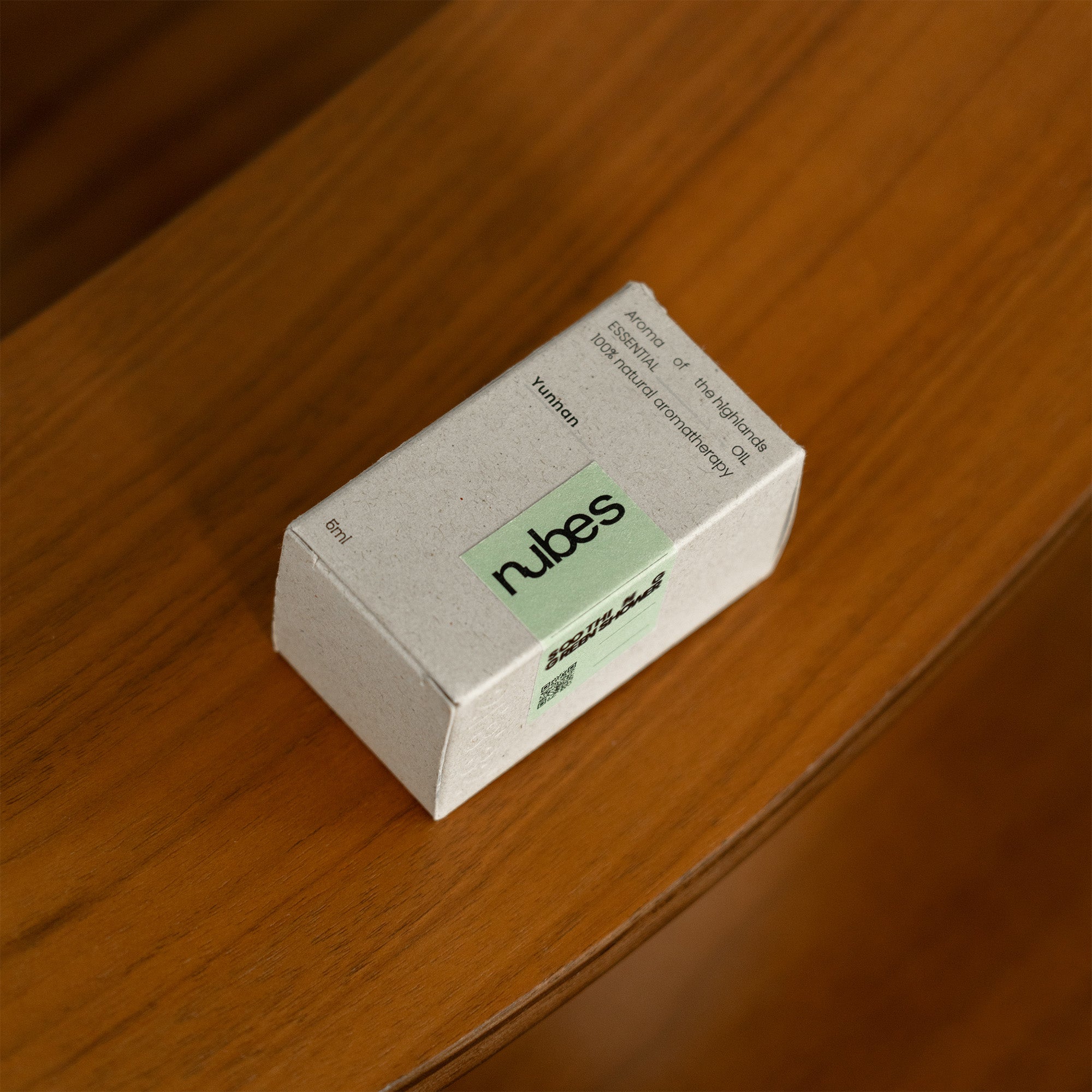 Box of nubes on a wooden surface