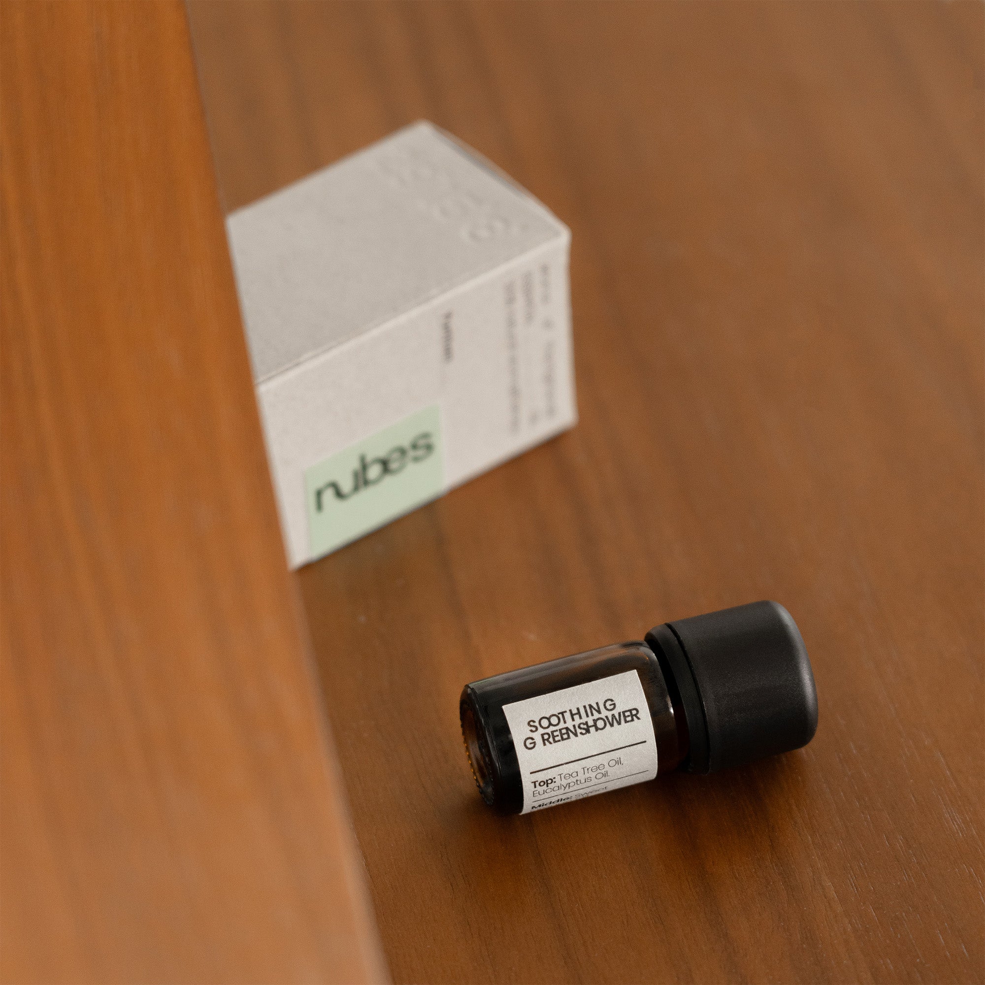 Small bottle and box labeled &