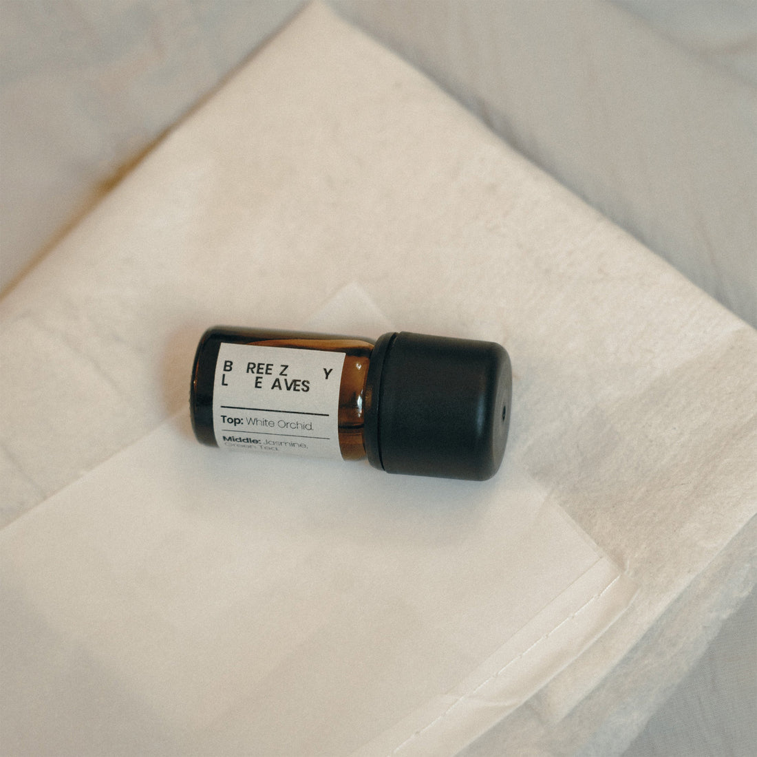 Essential oil bottle labeled &
