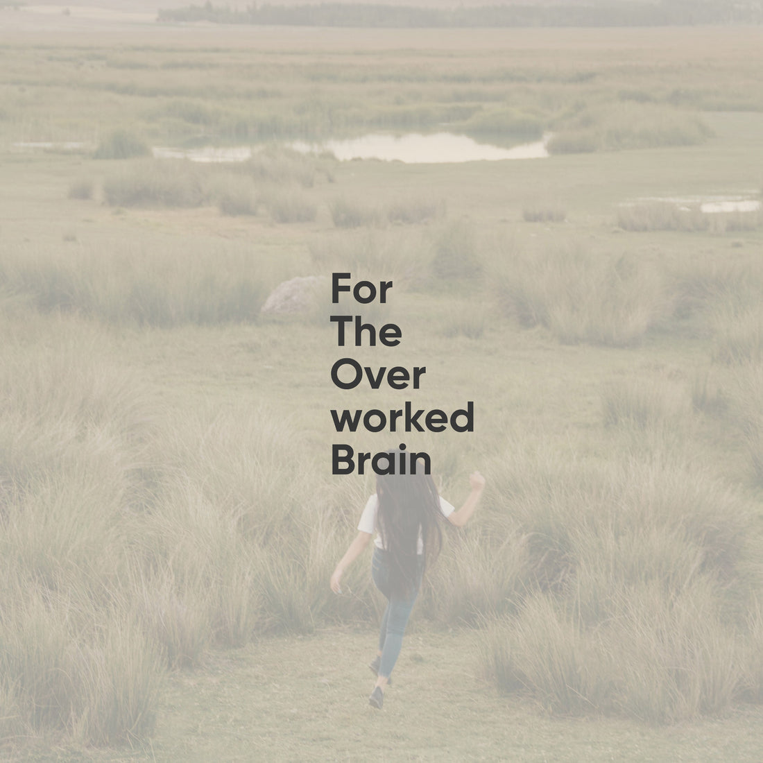 Person walking through a field with text &